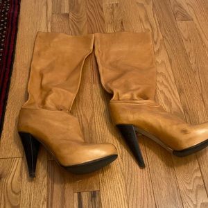 Bally knee high boots. Bottoms have been redone at Maurice